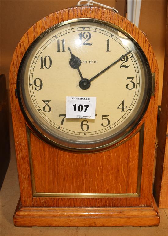 An early 20th century oak cased PUL-SYN-ETIC electric pendulum type impulse master clock and similar slave mantel timepiece, 4ft 4.5in.